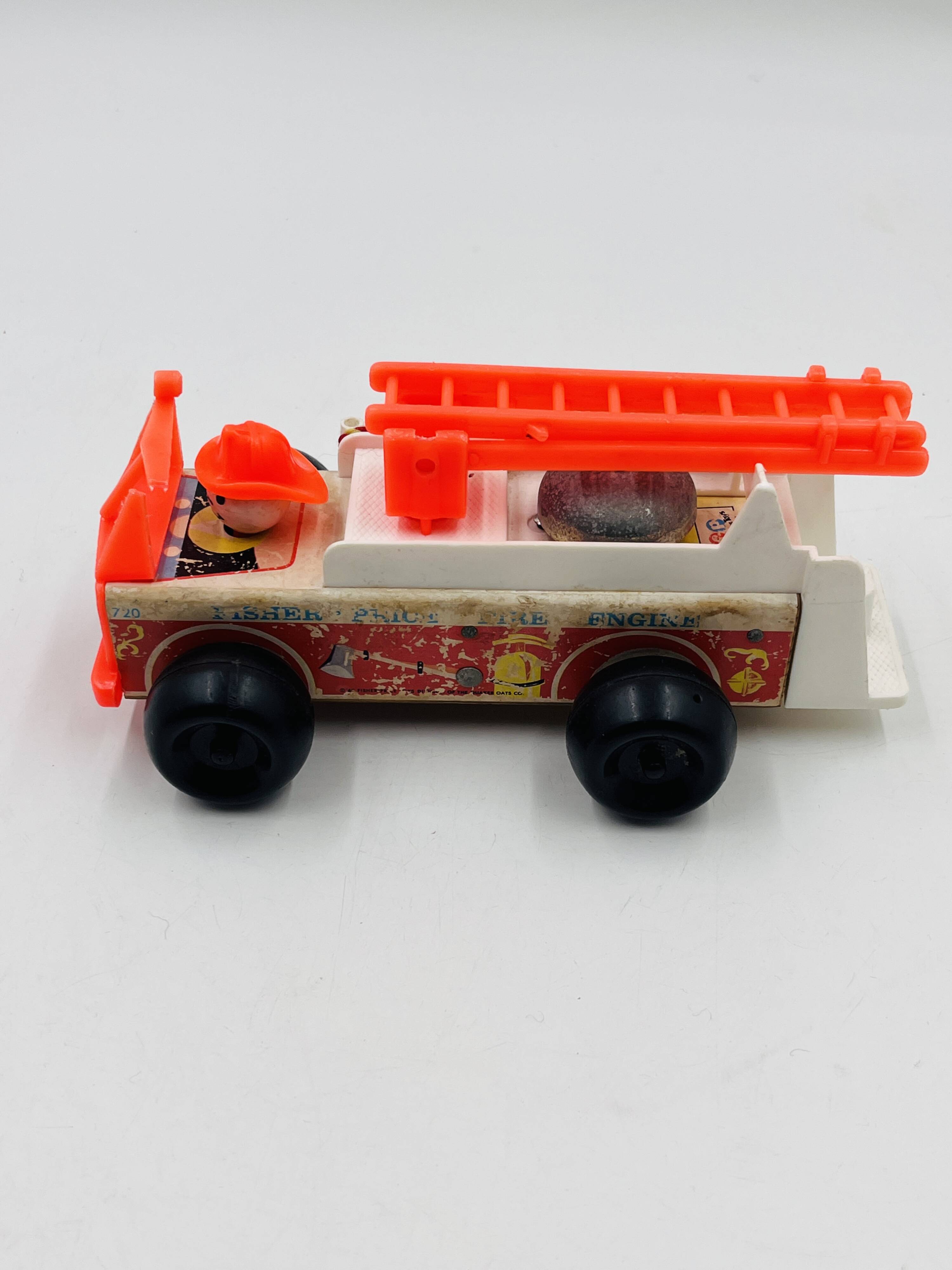 Set of 4 Fisher-Price wooden toys from the 1960s