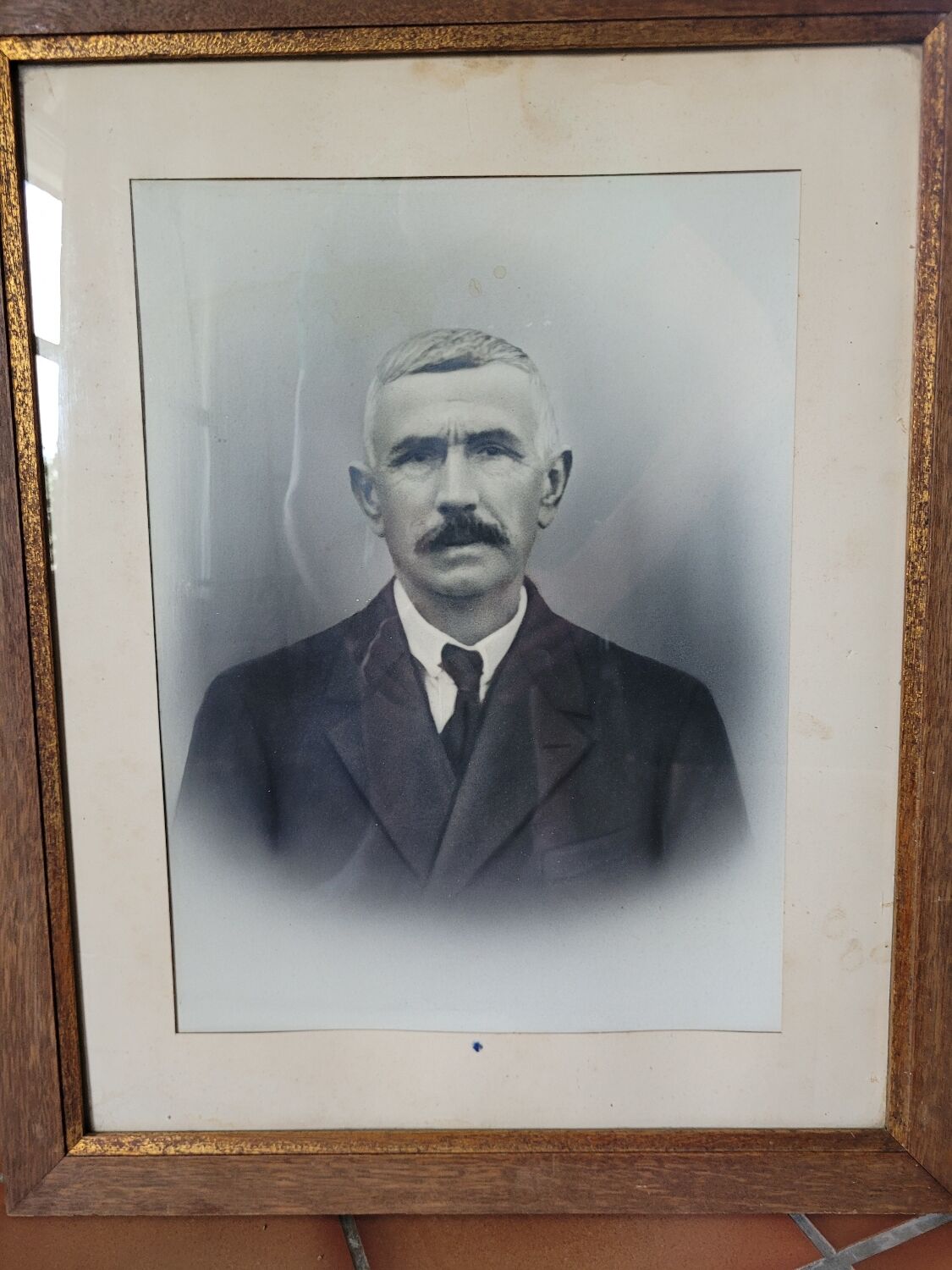 Framed portrait of a man.
