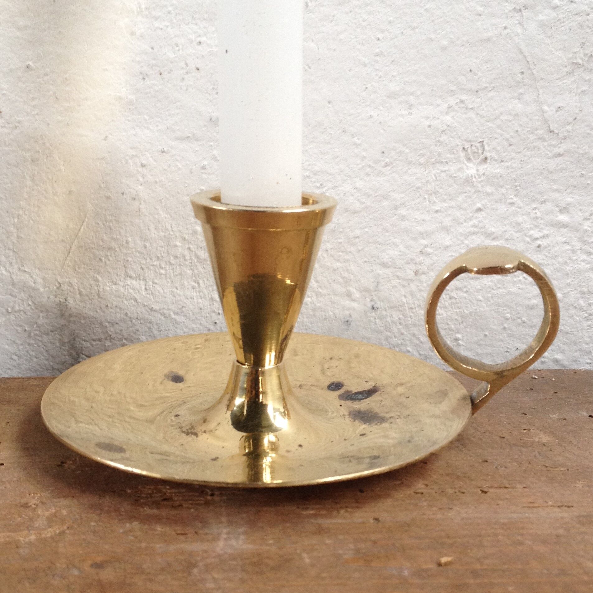 Pair of brass cellar rat candlesticks