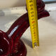 Ruby red ceramic pocket ashtray from Vallauris, numbered.