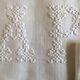 pair of AP monogram towels in cold linen