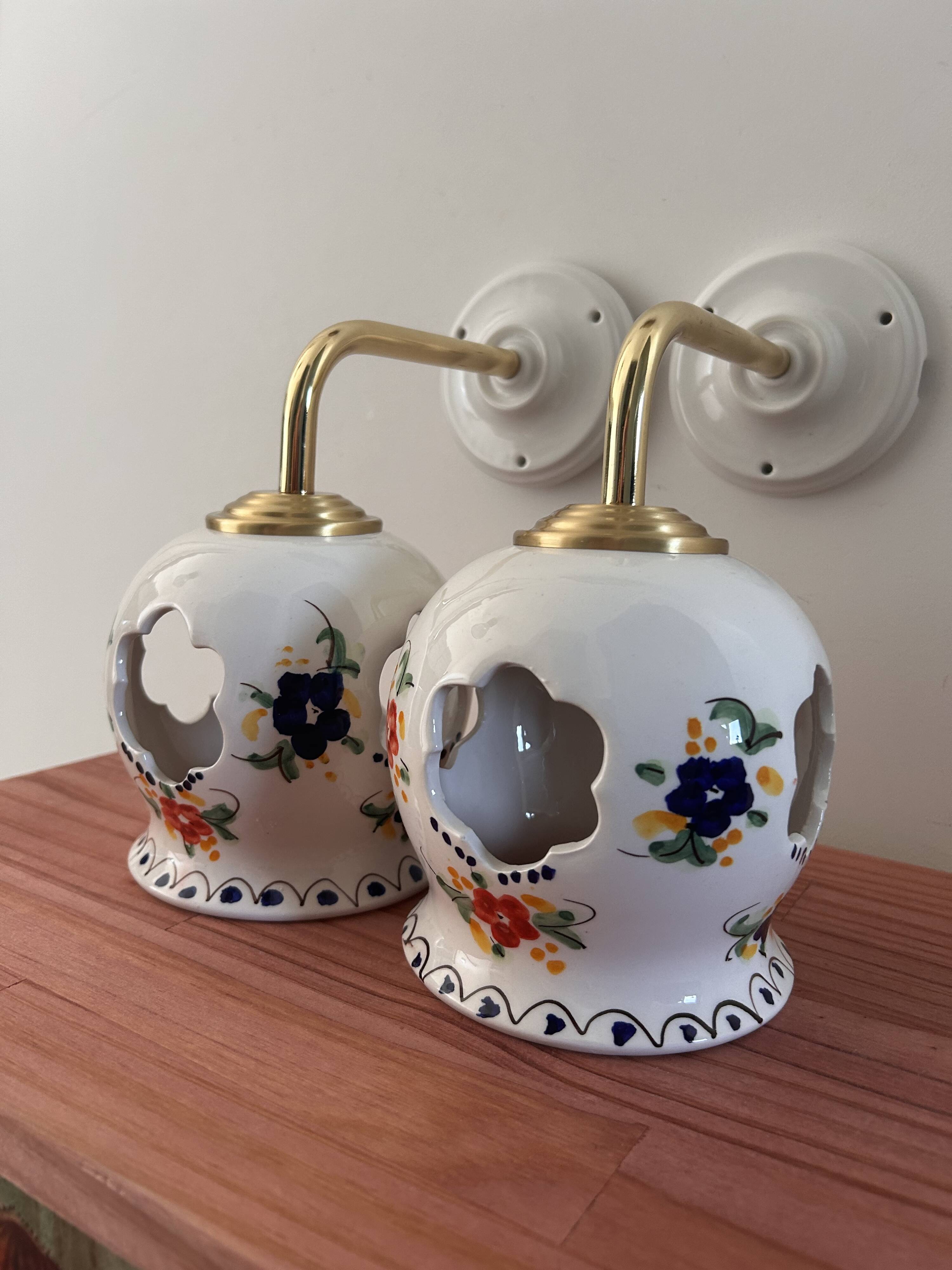 Pair of openwork ceramic wall lights