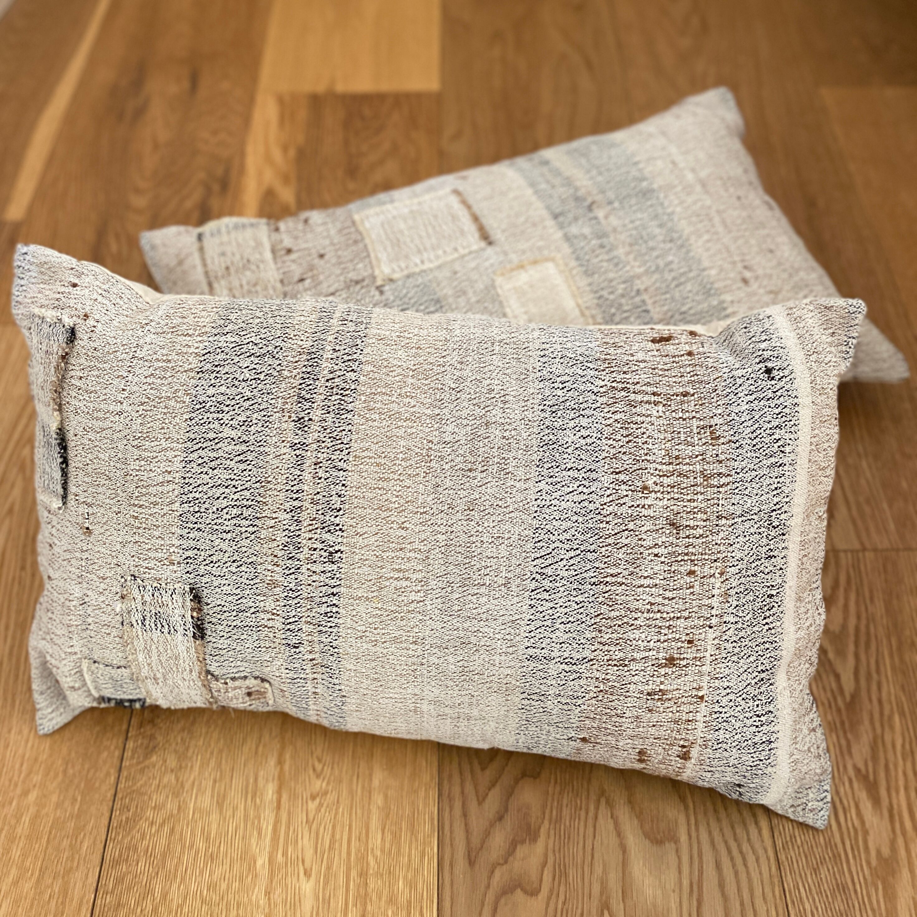 Cushion in vintage woven kilim style, patched.