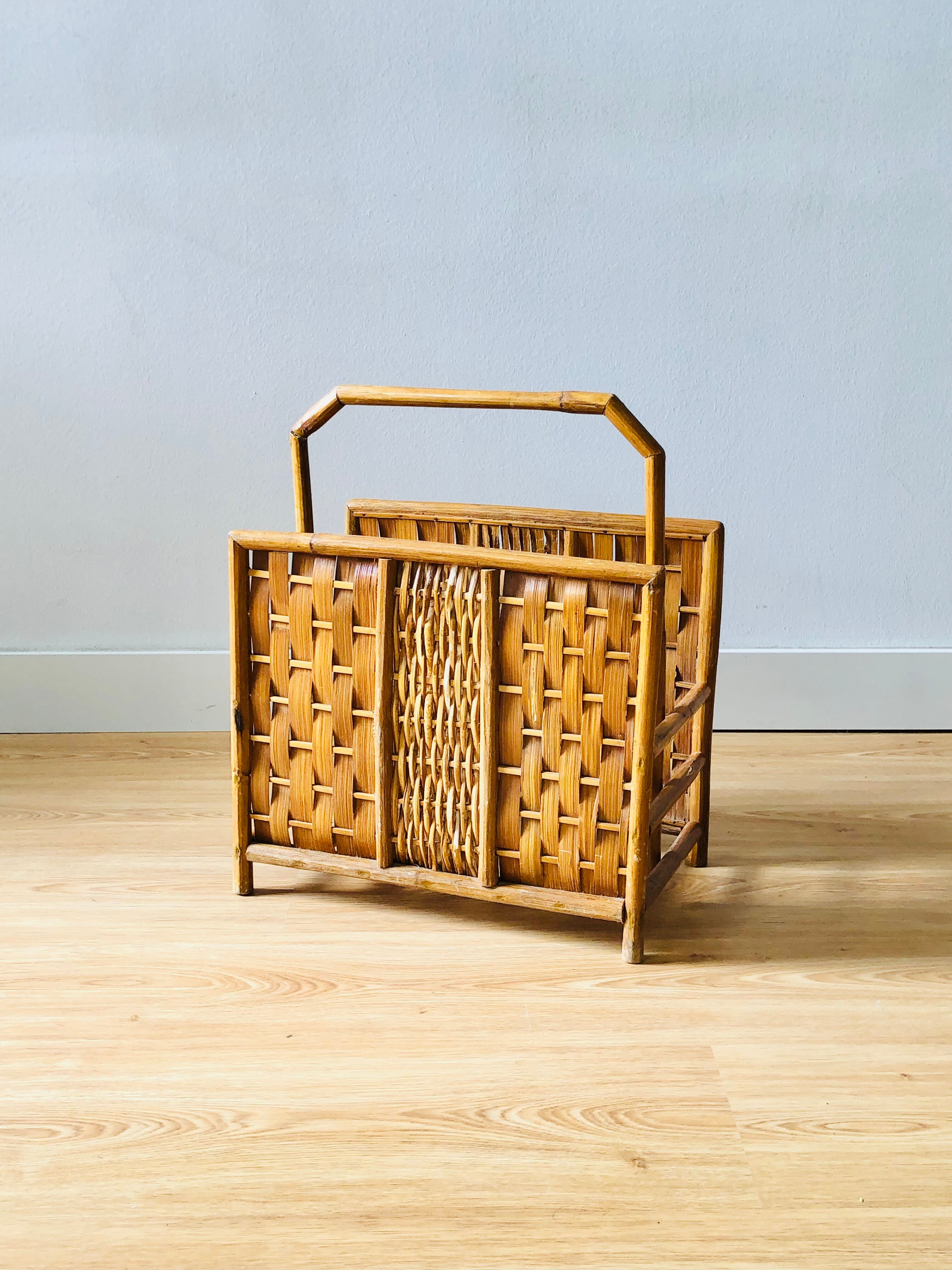 Vintage rattan magazine holder with floral decoration