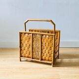 Vintage rattan magazine holder with floral decoration