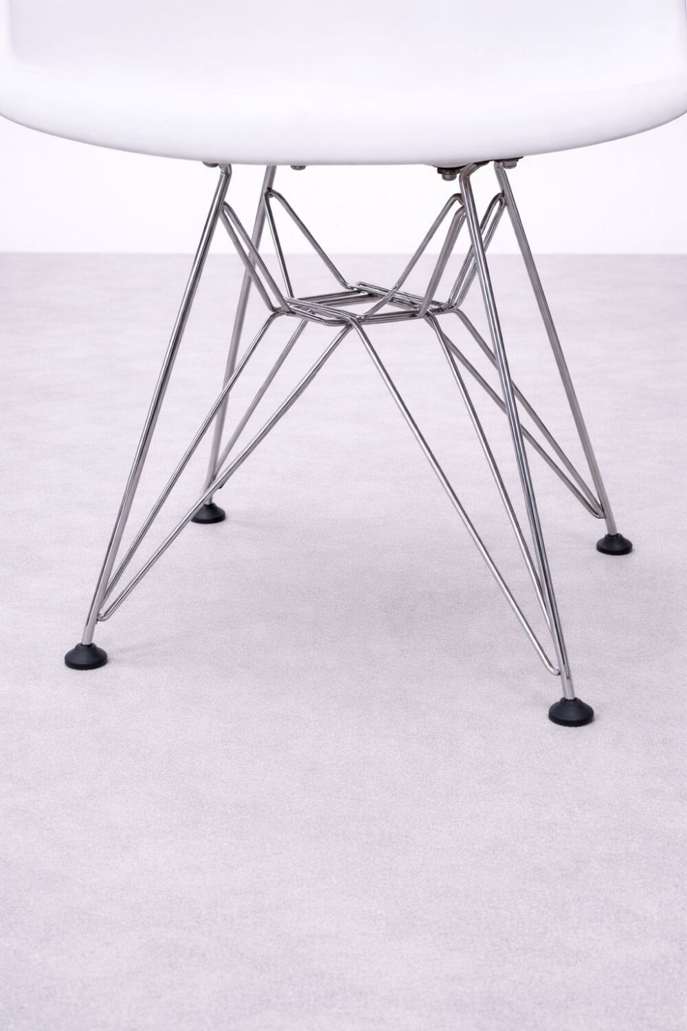White DSR style Eames chair by Vitra with chrome Eiffel base.
