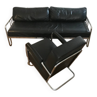 Sofa and armchair in chrome metal and black leather