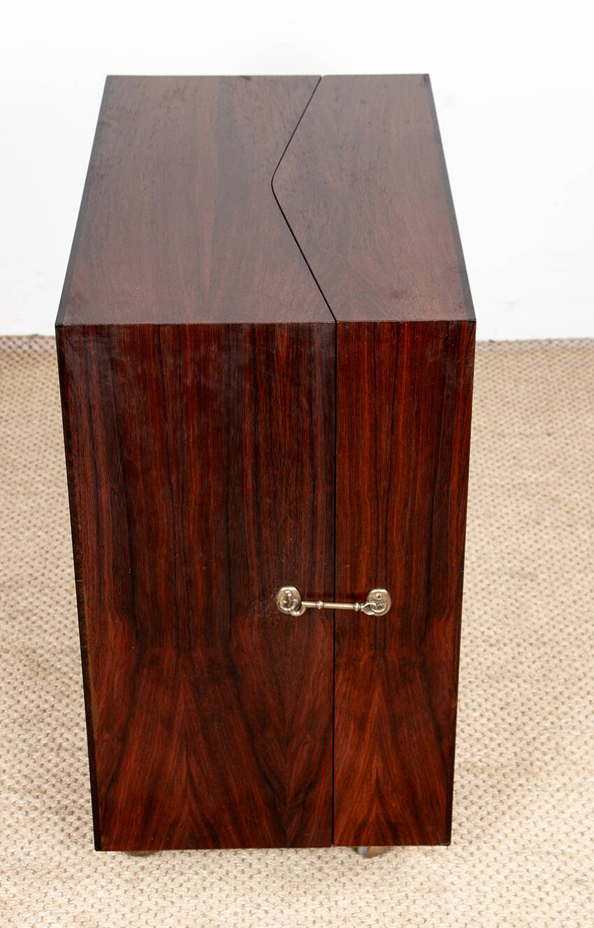 Danish bar cabinet on wheels in rosewood and brass by Jorgen Clausen