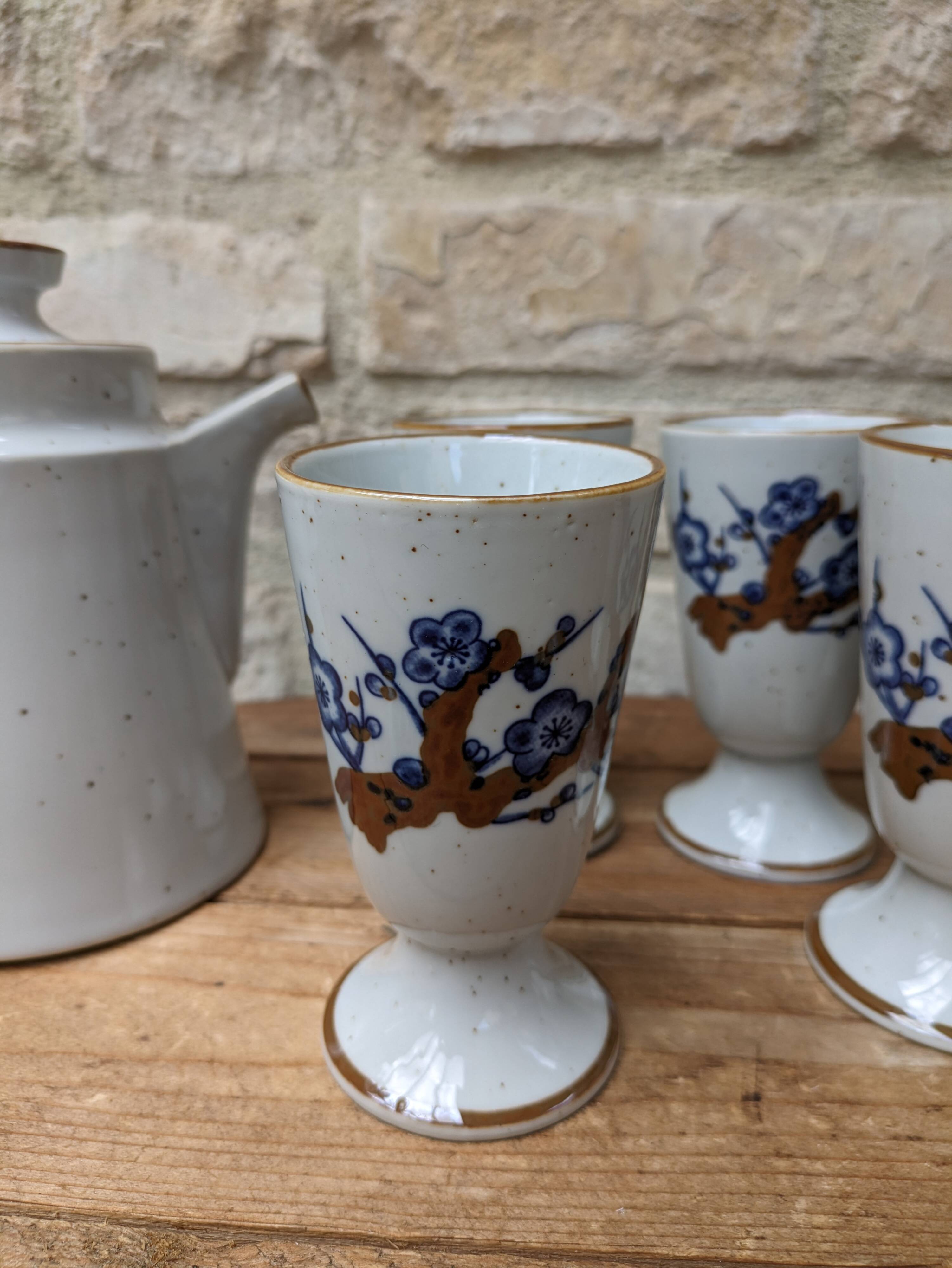 Old coffee service with 6 mazagrans and coffee pot with blue floral decoration