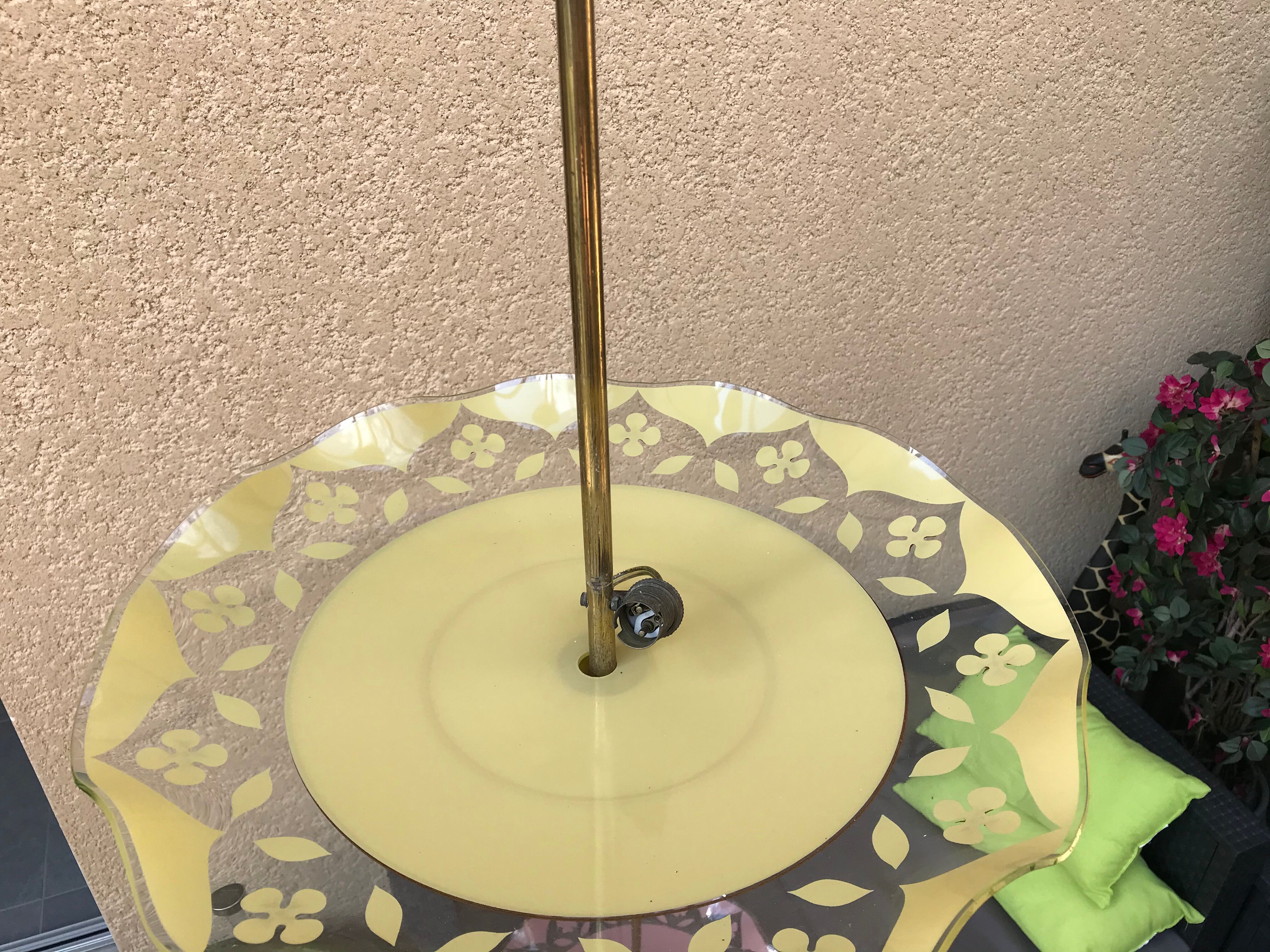 Brass and yellow glass hanging lamp