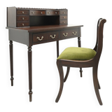 A desk with an English-style chair. After professional renovation.