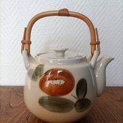 Asian style teapot with bamboo handle