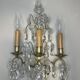 19th-century wall sconce, bronze and crystal pendants.