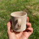 Duo of old beige Veillard Bordeaux coffee cups