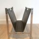 Magazine rack in brushed steel and leather, in the style of Poul Kjaerholm