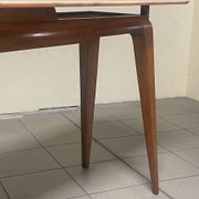 Console from the 1950s with a pink marble top and a cherry wood frame.