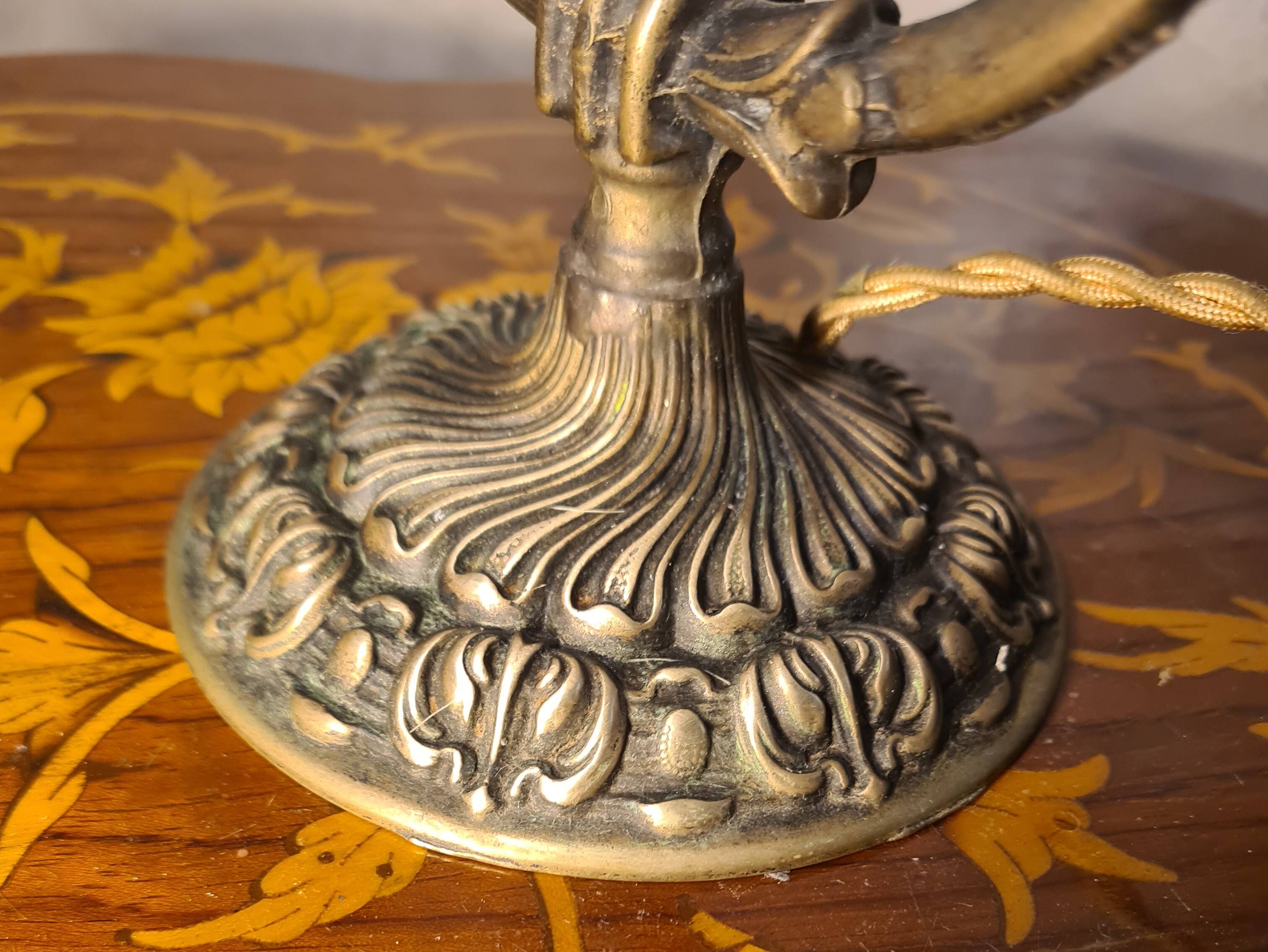 Bronze and brass lamp, transparent and blue glass shade.