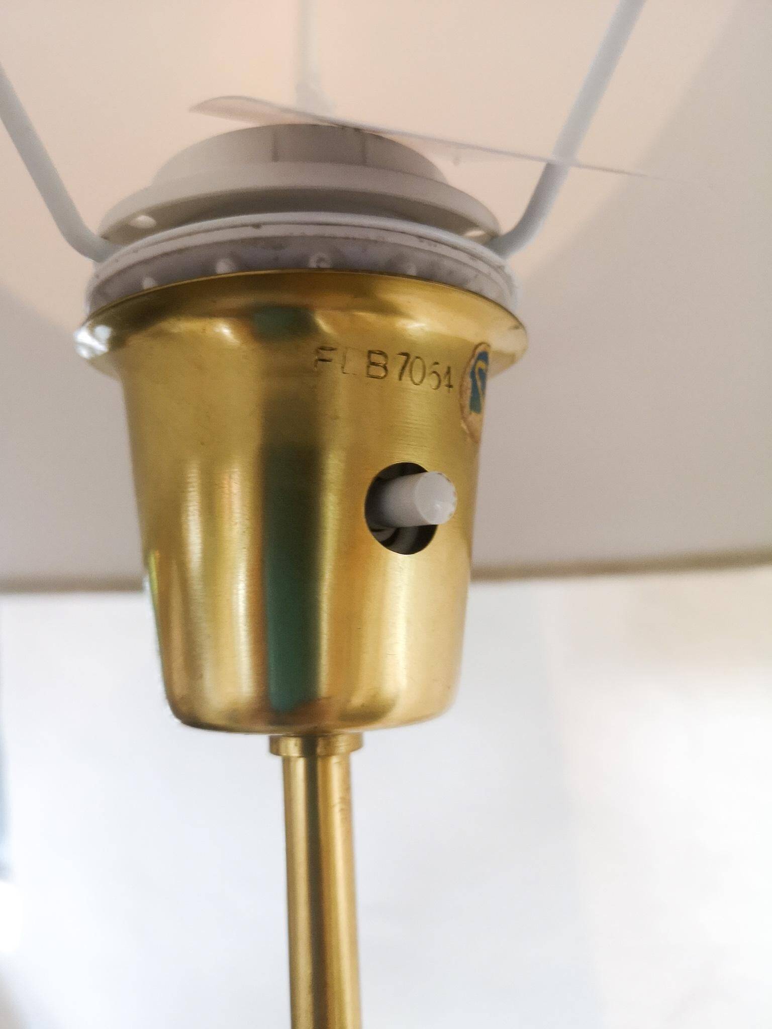 Mid-century floor lamp in teak and brass by Falkenbergs Belysning, Sweden, 1960s.