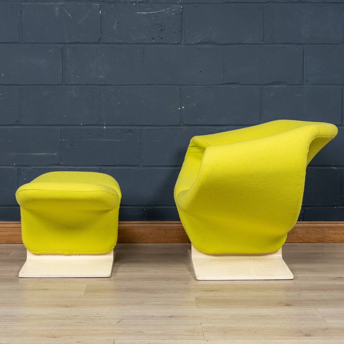 A 20thC RIBBON CHAIR & FOOTSTALL BY PIERRE PAULIN FOR ARTIFORT, FRANCE