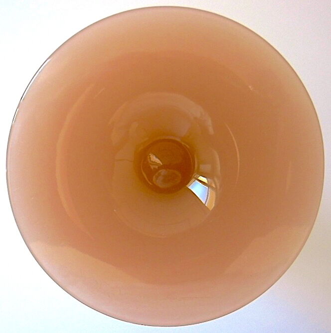 Ancient conical vase on pink soapy opaline feet