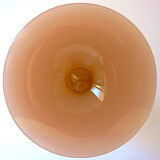 Ancient conical vase on pink soapy opaline feet