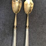 Pair of serving spoons in silver hallmark neck brace