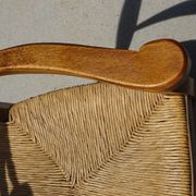 Ancien fauteuil à l'assise paillée
