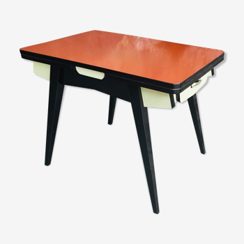 Table vintage à rallonges et tiroirs formica rouge orangé pieds compas - 1960