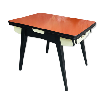 Table vintage à rallonges et tiroirs formica rouge orangé pieds compas - 1960