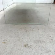 Coffee table by Robert Debiève in ash veneer, glass and brass, France 1950.