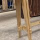 Chestnut and walnut solid table and benches with a central leg.