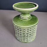 Green glazed ceramic flowerpot on stand