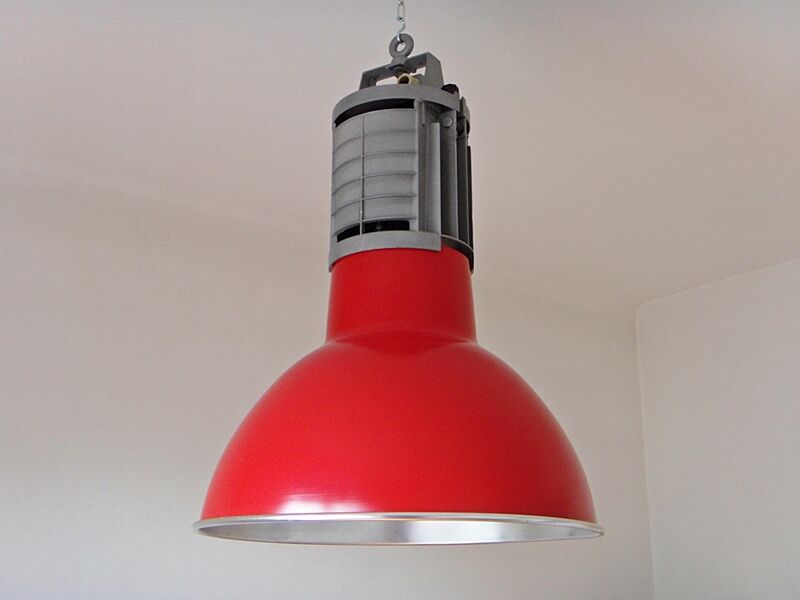 Large red aluminum lamp.