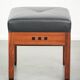 Ottoman en cuir noir au design Art Déco