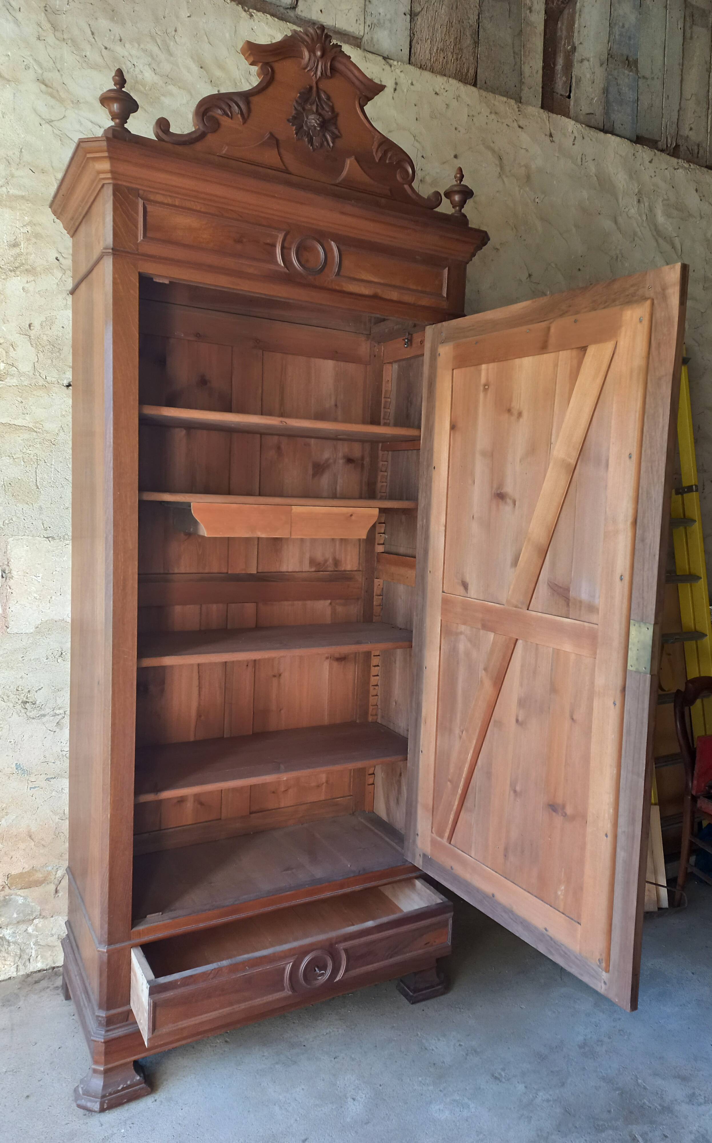 Superb Empire-style wardrobe in solid walnut.