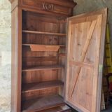 Superb Empire-style wardrobe in solid walnut.