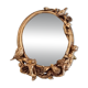 Oval wall mirror in Art Nouveau style with a decoration of birds and roses.