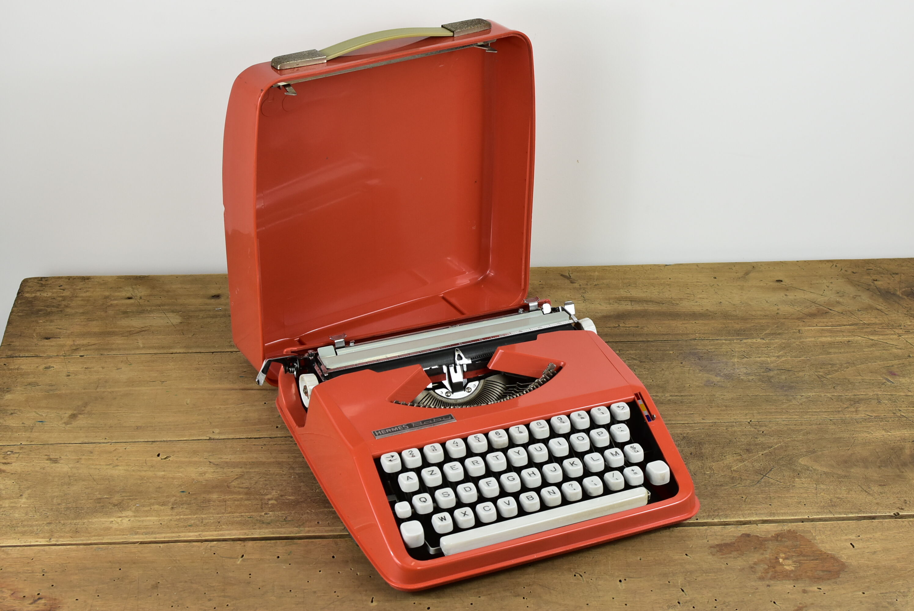 Hermès Baby orange typewriter.