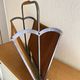 Vintage magazine rack from the 1950s, leather, brass, wood.