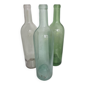 Set of 3 transparent glass bottles