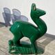 Art Deco figurine of a green ceramic doe