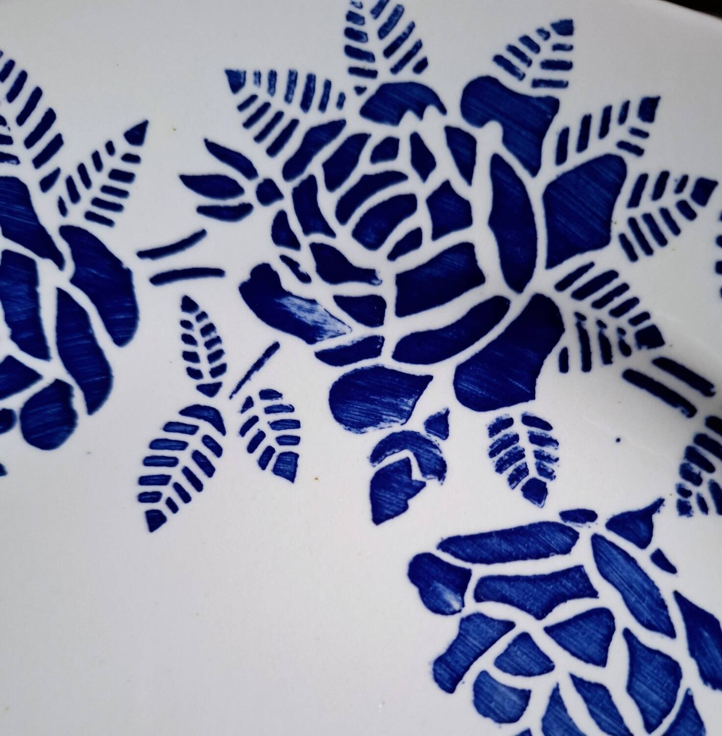 Mismatched antique flat plates in earthenware