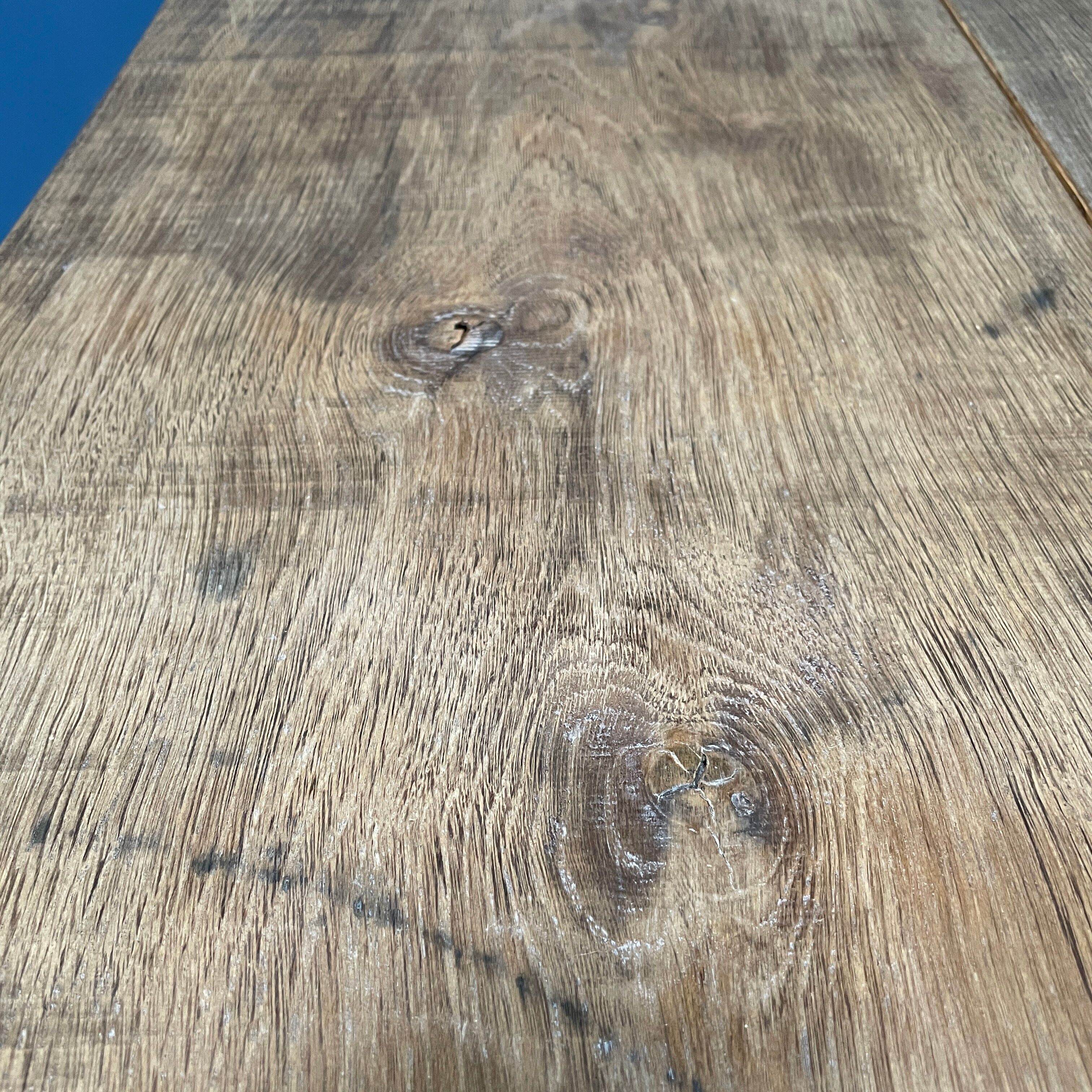 Handmade industrial oak dining table with black metal legs