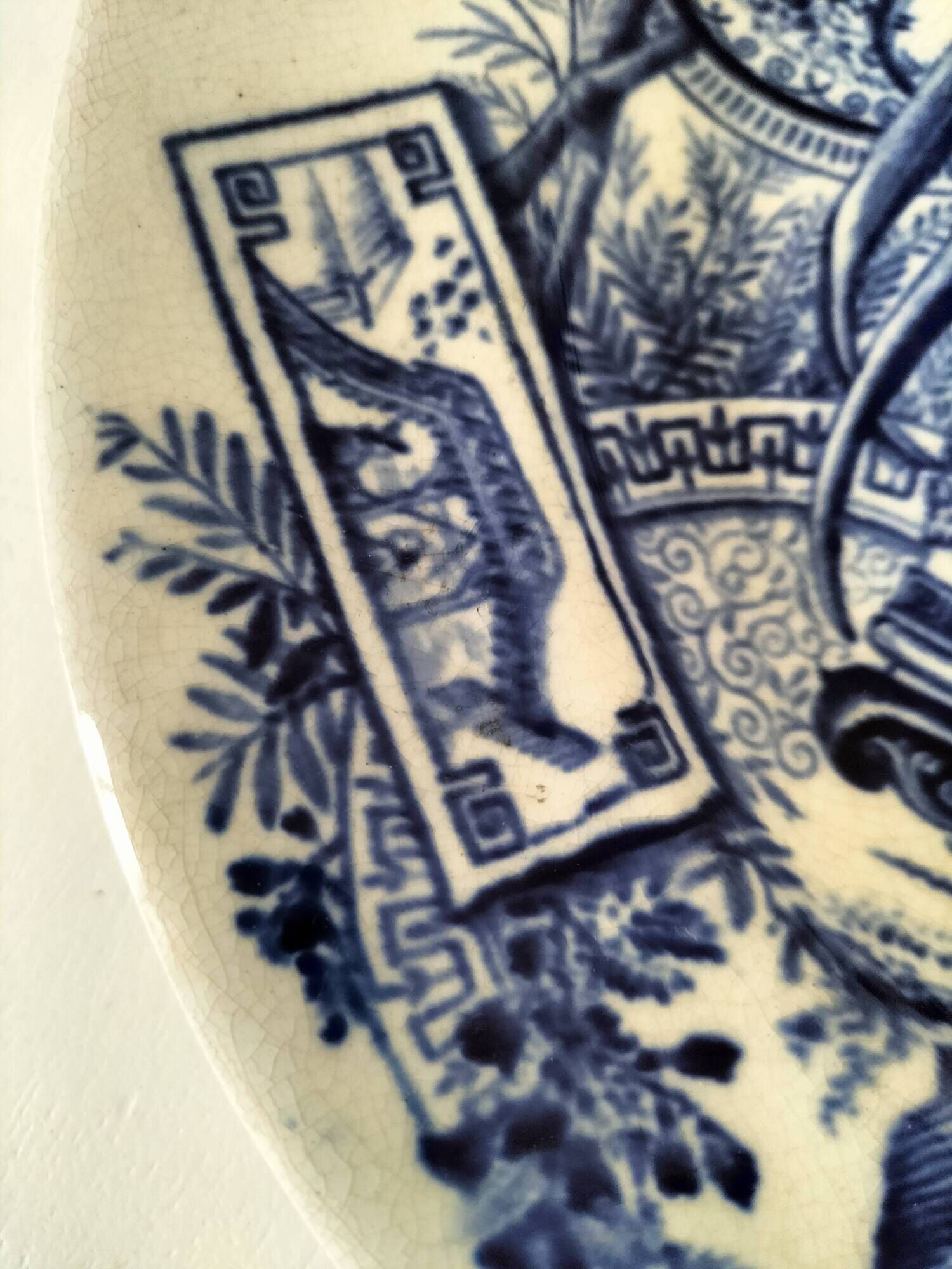 Antique plate with Chinese blue oriental decoration from the late 19th century.