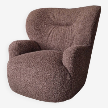 Brown and new round swivel armchair