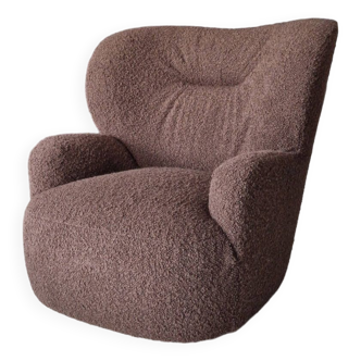 Brown and new round swivel armchair