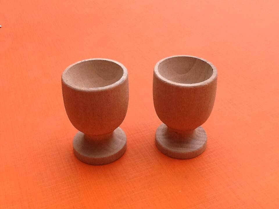 Two shells on foot shower turned wood raw finish