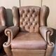 Pair of Chesterfield leather wingback armchairs