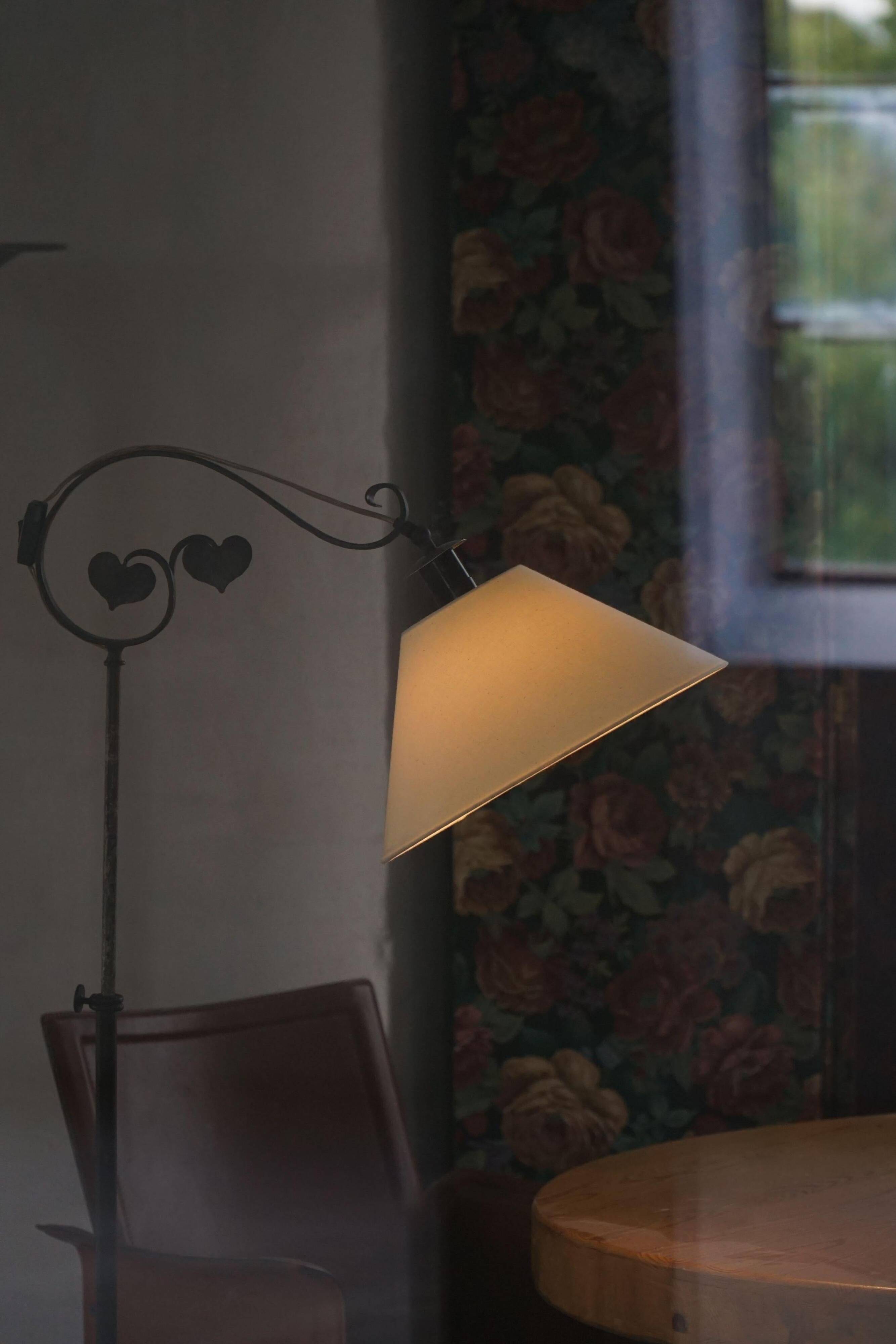 Danish Art Deco, adjustable wrought iron floor lamp, 1930s