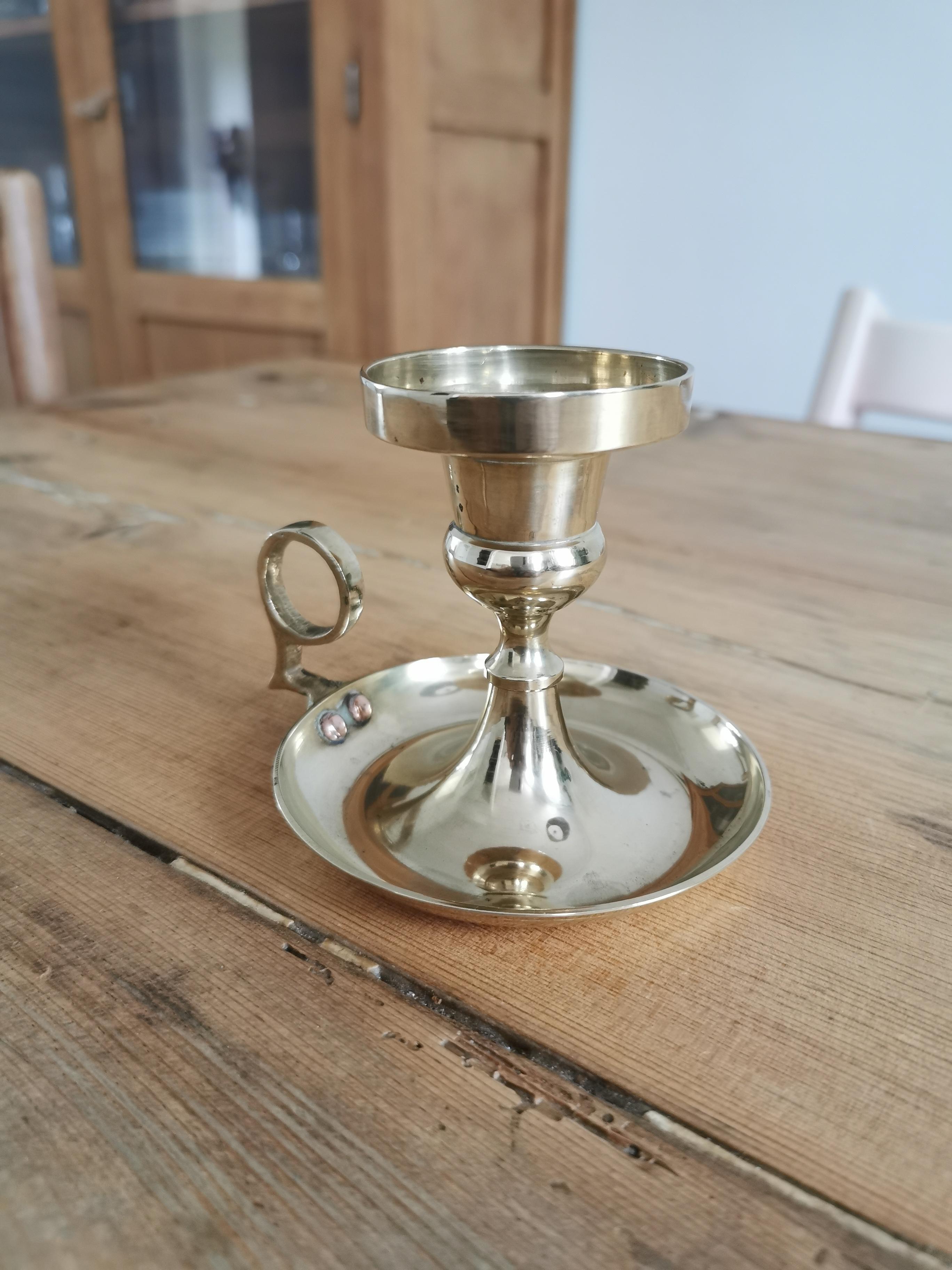 Brass cellar rat candle holder